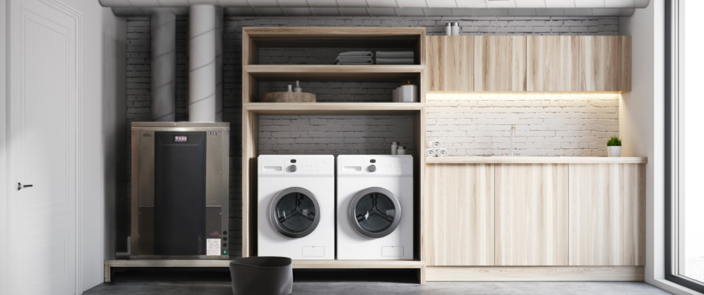 utility room with the CERV2 installed next to a washer and dryer